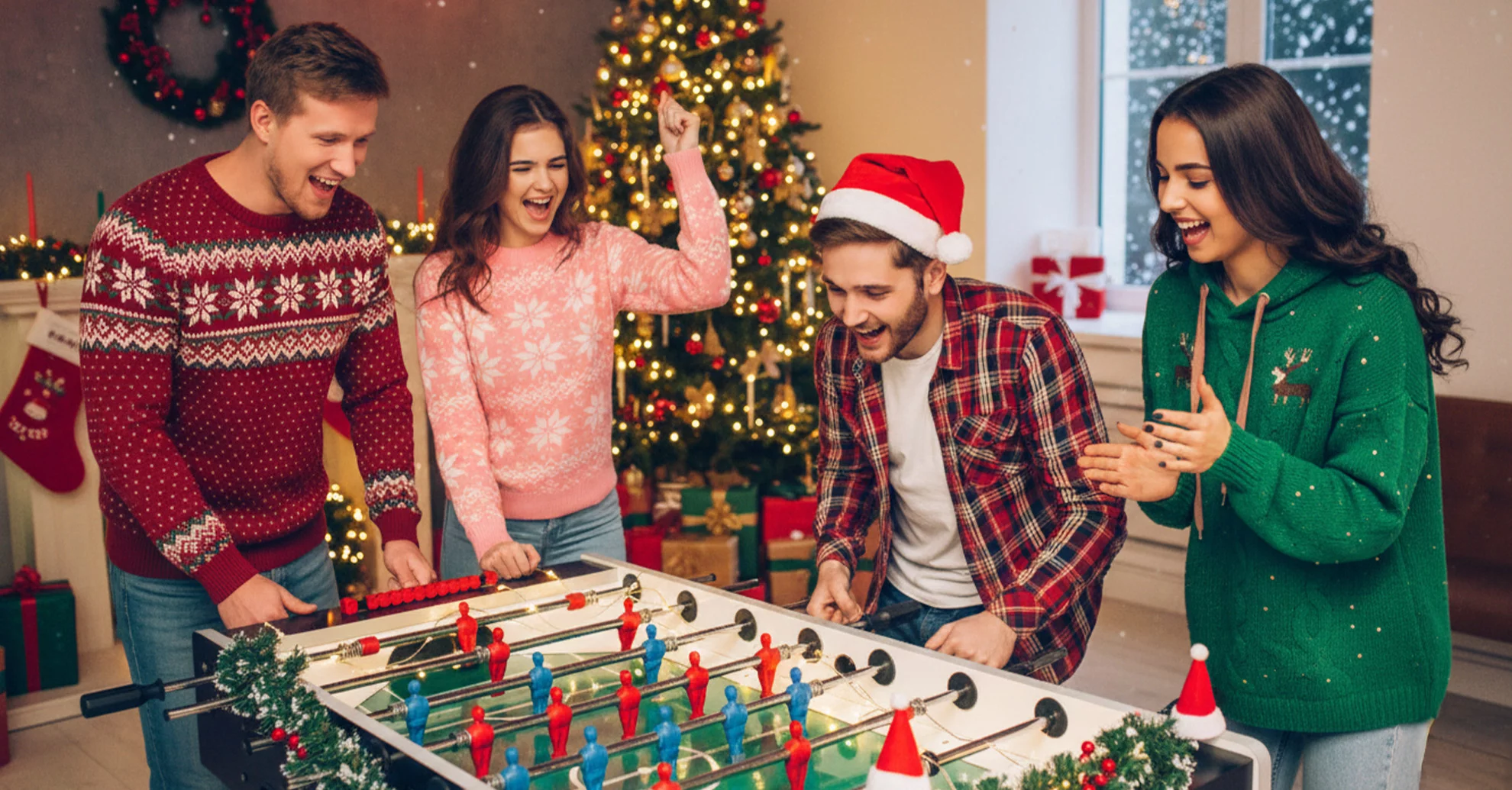 Friends playing table football