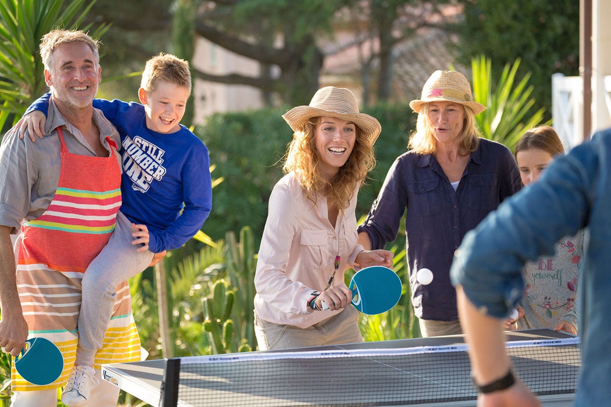 Family playing table tennis