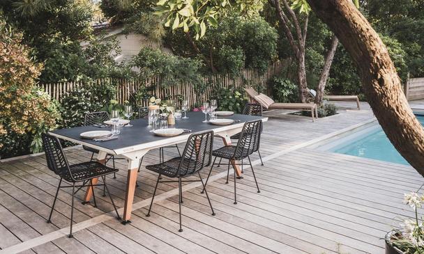 Cornilleau Medium Play-Style Outdoor Ping Table - White Frame / Dark Stone Top