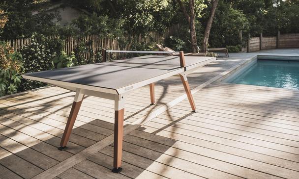 Cornilleau Medium Play-Style Outdoor Ping Table - White Frame / Dark Stone Top