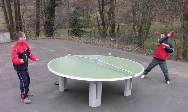 People Playing on Butterfly R2000 Concrete Table Tennis Table