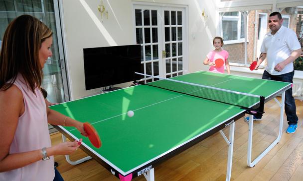 Butterfly Compact 19 (full size, compact storage) Indoor Table Tennis Table With Dad and Daughter