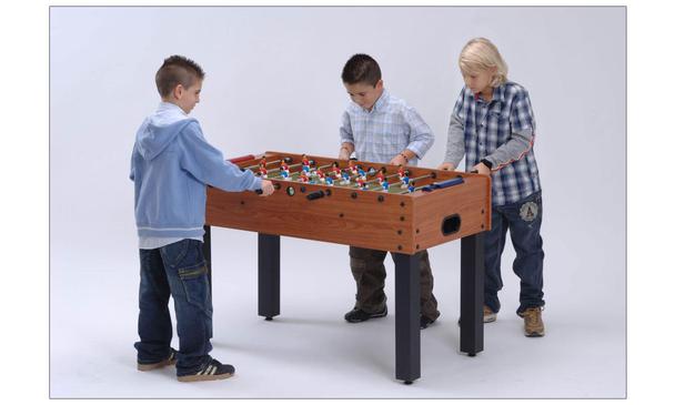 Three Kids Playing on Garlando F1 Football Table