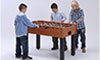 Three Kids Playing on Garlando F1 Football Table